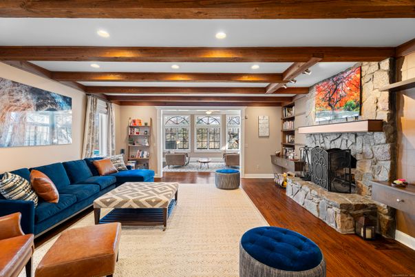 Fireplace, Interior, Living room, Recessed Lighting, Stone Walls, Wooden Beams, Wood Texture Flooring