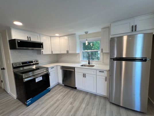 Interior, Kitchen, Pendant Lights, Recessed Lighting, Stainless Steel Appliances, Wood Texture Flooring