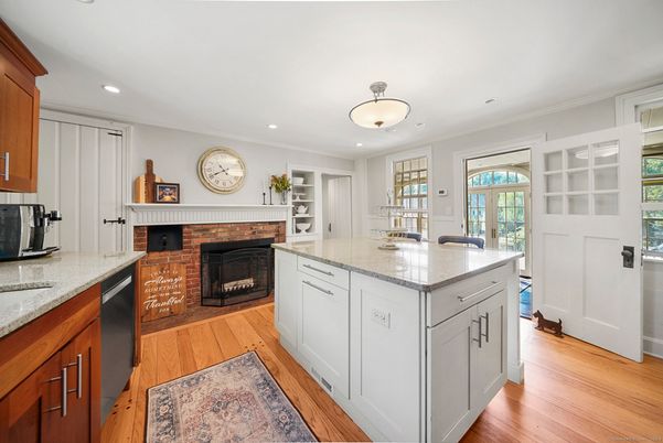 Fireplace, Interior, Kitchen, Recessed Lighting, Wood Texture Flooring