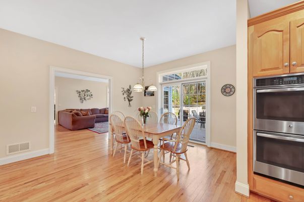 Dining room, Interior, Kitchen, Pendant Lights, Stainless Steel Appliances, Wood Texture Flooring