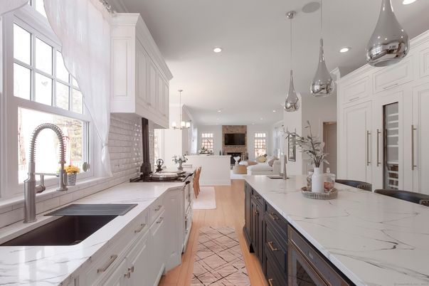 Chandelier, Dining room, Fireplace, Interior, Kitchen, Living room, Marble, Pendant Lights, Recessed Lighting, Wood Texture Flooring