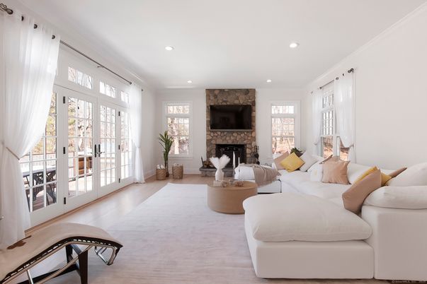 Fireplace, Interior, Living room, Recessed Lighting, Stone Walls, Wood Texture Flooring