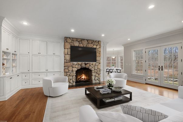 Fireplace, Interior, Living room, Pendant Lights, Recessed Lighting, Stone Walls, Wood Texture Flooring