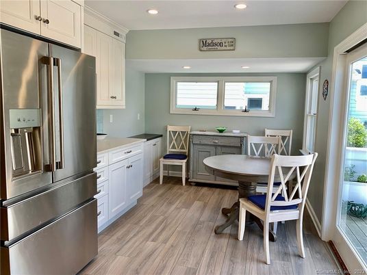 Dining room, Interior, Kitchen, Recessed Lighting, Stainless Steel Appliances, Wood Texture Flooring