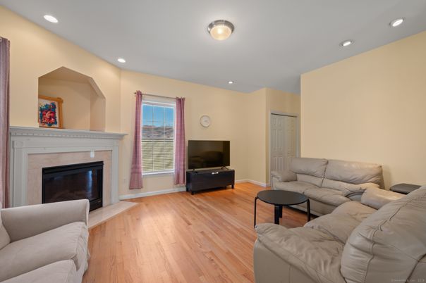 Fireplace, Interior, Living room, Recessed Lighting, Wood Texture Flooring