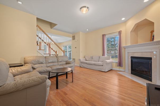 Fireplace, Interior, Living room, Recessed Lighting, Wood Texture Flooring