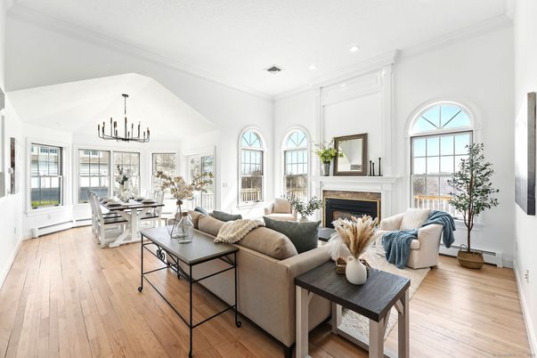 Chandelier, Dining room, Fireplace, Interior, Living room, Recessed Lighting, Wood Texture Flooring