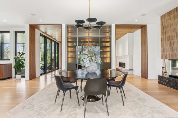 Dining room, Fireplace, Interior, Pendant Lights, Recessed Lighting, Wood Texture Flooring
