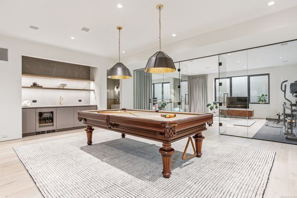 Billiard Table, Fitness Equipment, Game Room, Interior, Pendant Lights, Recessed Lighting, Wood Texture Flooring