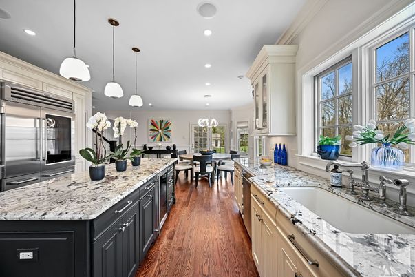 Chandelier, Dining room, Interior, Kitchen, Pendant Lights, Recessed Lighting, Stainless Steel Appliances, Wood Texture Flooring