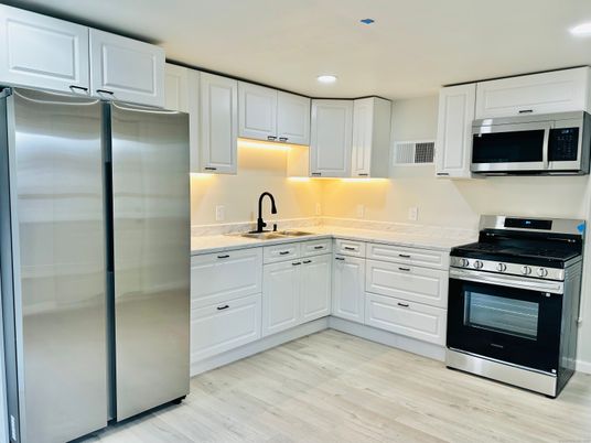 Interior, Kitchen, Recessed Lighting, Stainless Steel Appliances, Wood Texture Flooring