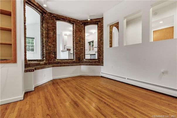 Empty room, Interior, Recessed Lighting, Stone Walls, Wood Texture Flooring