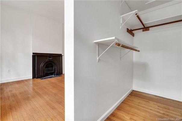Fireplace, Interior, Utility Closets, Washer, Wood Texture Flooring
