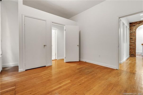 Empty room, Interior, Recessed Lighting, Stone Walls, Wood Texture Flooring
