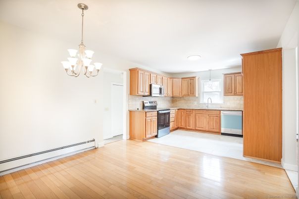 Chandelier, Interior, Kitchen, Stainless Steel Appliances, Wood Texture Flooring