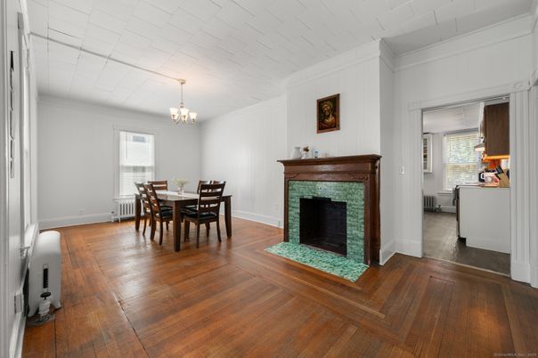 Chandelier, Dining room, Fireplace, Interior, Wood Texture Flooring