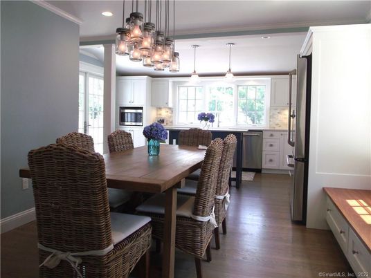 Dining room, Interior, Kitchen, Pendant Lights, Recessed Lighting, Stainless Steel Appliances, Wood Texture Flooring
