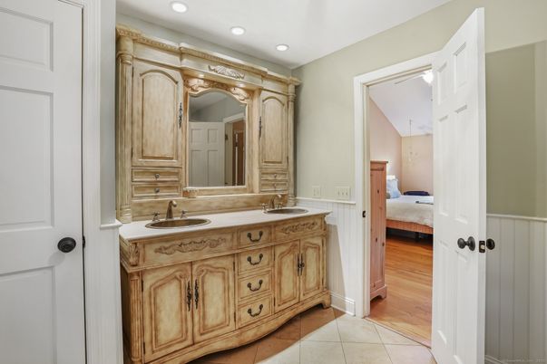 Bathroom, Bedroom, Dual Sink Vanities, Interior, Recessed Lighting, Wood Texture Flooring