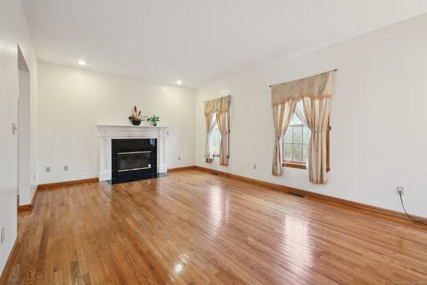 Empty room, Fireplace, Interior, Recessed Lighting, Wood Texture Flooring