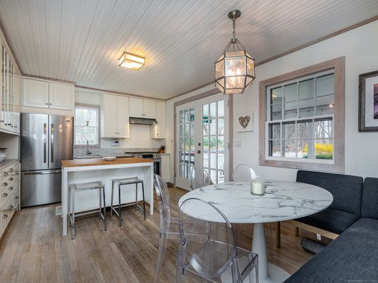 Dining room, Interior, Kitchen, Pendant Lights, Stainless Steel Appliances, Wood Texture Flooring