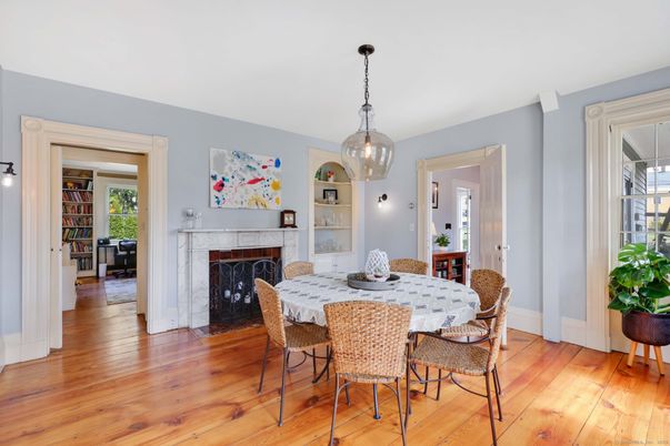 Dining room, Fireplace, Interior, Pendant Lights, Wood Texture Flooring