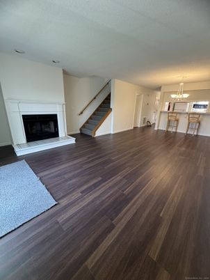 Empty room, Fireplace, Interior, Pendant Lights, Wood Texture Flooring