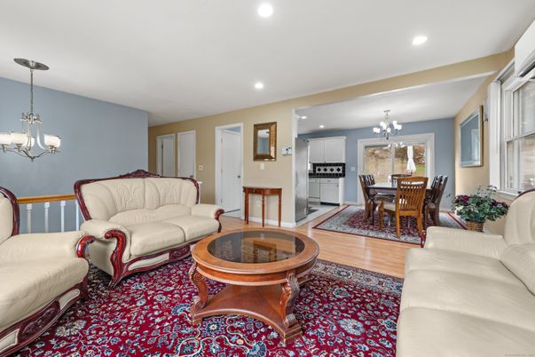 Chandelier, Dining room, Interior, Kitchen, Living room, Recessed Lighting, Stainless Steel Appliances, Wood Texture Flooring