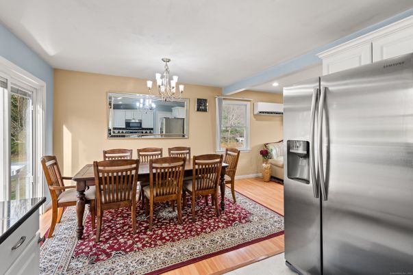 Chandelier, Dining room, Interior, Kitchen, Recessed Lighting, Stainless Steel Appliances, Wood Texture Flooring