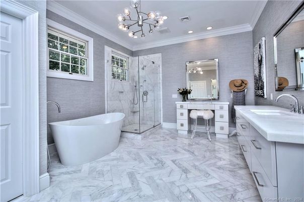 Bathroom, Dual Sink Vanities, Free Standing Baths, Glass Shower, Interior, Marble, Marble Walls, Pendant Lights, Recessed Lighting