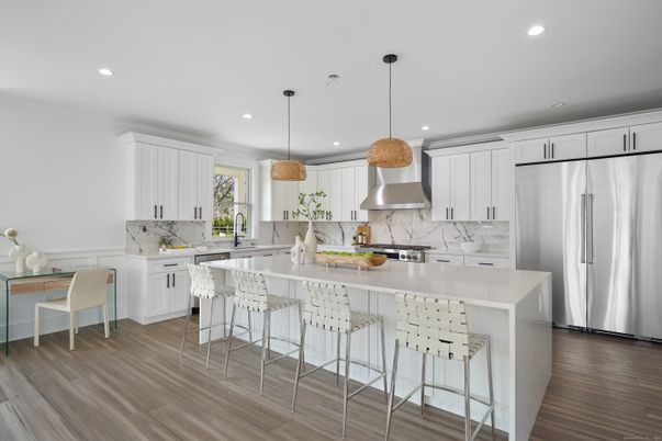 Interior, Kitchen, Marble Walls, Pendant Lights, Recessed Lighting, Stainless Steel Appliances, Wood Texture Flooring