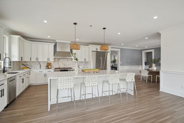Interior, Kitchen, Marble Walls, Pendant Lights, Recessed Lighting, Stainless Steel Appliances, Wood Texture Flooring