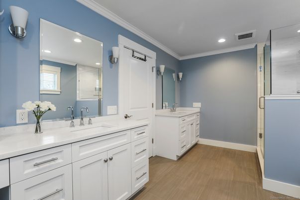 Bathroom, Dual Sink Vanities, Interior, Recessed Lighting, Wood Texture Flooring