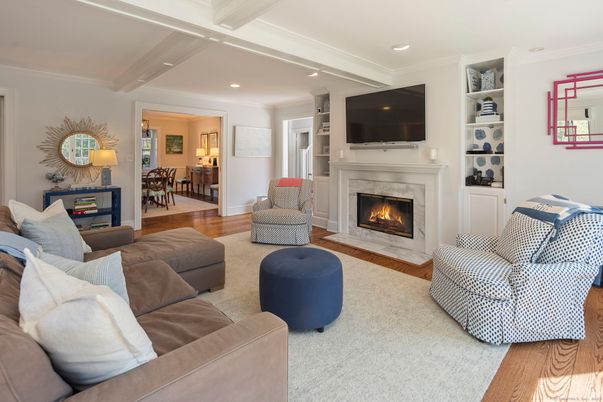 Dining room, Fireplace, Interior, Living room, Recessed Lighting, Wood Texture Flooring