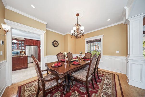 Chandelier, Dining room, Interior, Kitchen, Recessed Lighting, Stainless Steel Appliances, Wood Texture Flooring