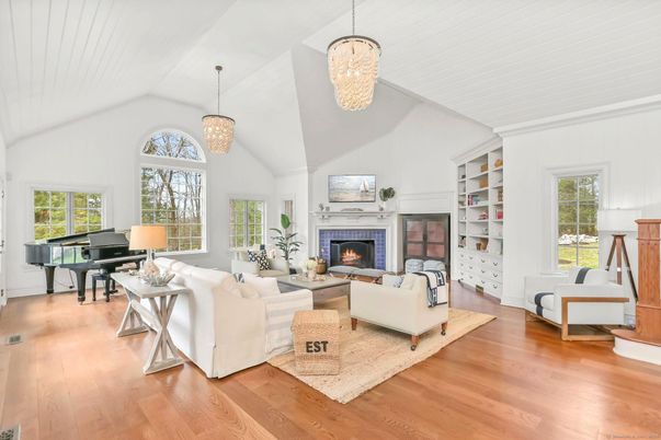 Chandelier, Fireplace, Interior, Living room, Pendant Lights, Piano, Wood Texture Flooring