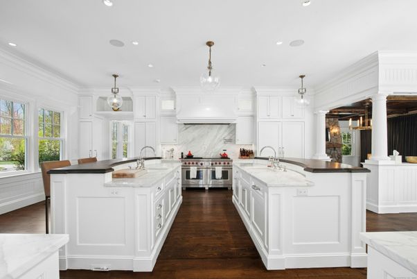 Interior, Kitchen, Marble Walls, Pendant Lights, Recessed Lighting, Stainless Steel Appliances, Wood Texture Flooring