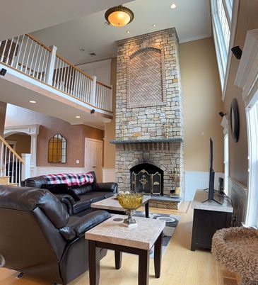 Fireplace, Interior, Living room, Recessed Lighting, Stone Walls, Wood Texture Flooring