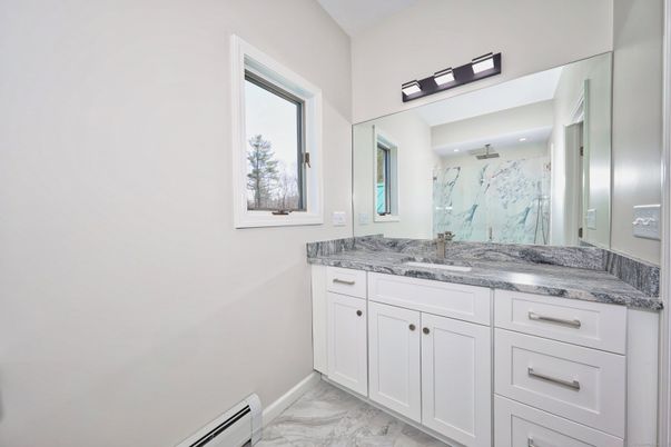 Bathroom, Dual Sink Vanities, Interior, Marble, Marble Walls, Recessed Lighting