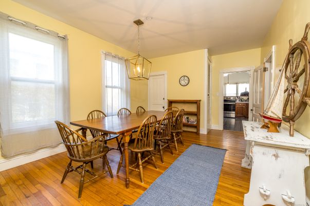 Dining room, Fireplace, Interior, Pendant Lights, Wood Texture Flooring