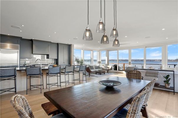 Dining room, Interior, Kitchen, Living room, Pendant Lights, Recessed Lighting, Stainless Steel Appliances, Water, Wood Texture Flooring