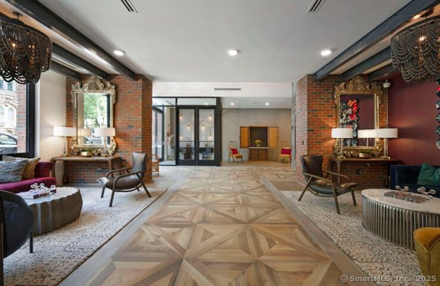 Fireplace, Interior, Living room, Recessed Lighting, Stone Walls, Wood Texture Flooring