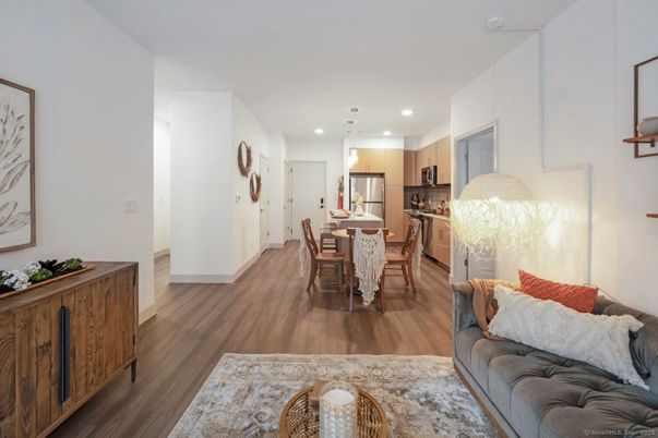 Dining room, Interior, Kitchen, Living room, Pendant Lights, Recessed Lighting, Stainless Steel Appliances, Wood Texture Flooring