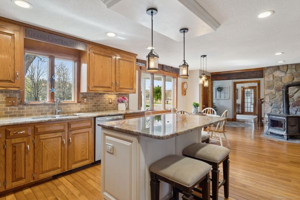 Dining room, Fireplace, Interior, Kitchen, Pendant Lights, Recessed Lighting, Stone Walls, Wood Texture Flooring