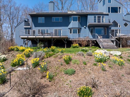 Exterior, Facade, Solar Panels, Raised Ranch