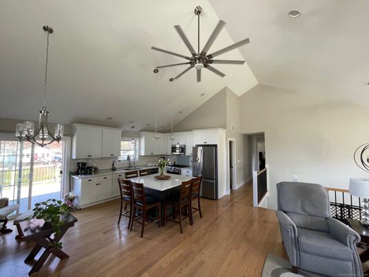 Dining room, Interior, Kitchen, Pendant Lights, Recessed Lighting, Stainless Steel Appliances, Wood Texture Flooring