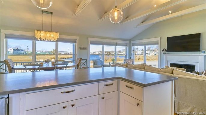 Chandelier, Dining room, Fireplace, Interior, Kitchen, Living room, Pendant Lights, Water