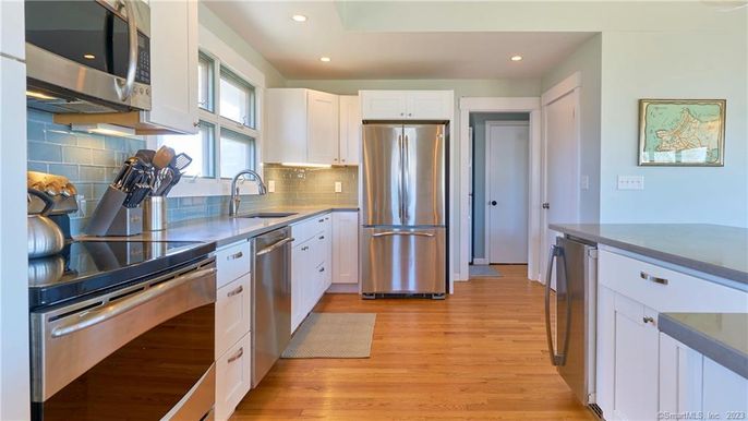 Interior, Kitchen, Recessed Lighting, Stainless Steel Appliances, Wood Texture Flooring