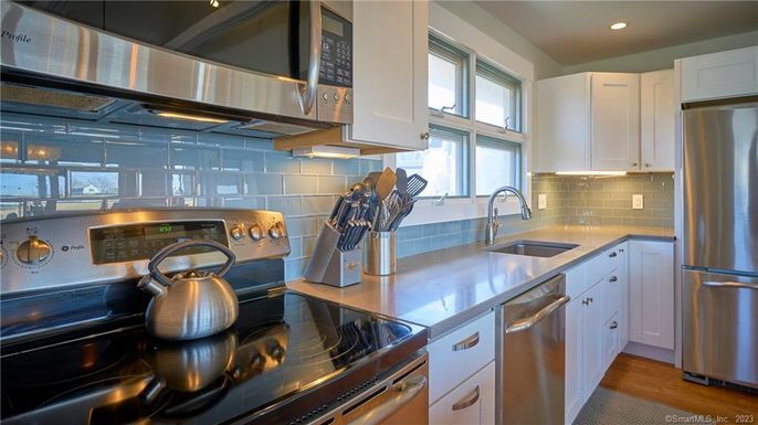 Interior, Kitchen, Recessed Lighting, Stainless Steel Appliances, Wood Texture Flooring