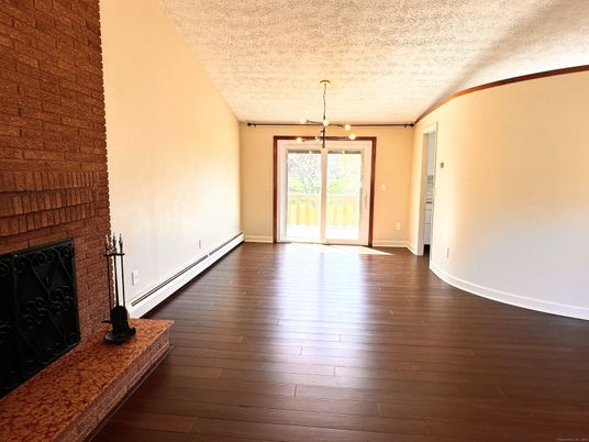 Empty room, Fireplace, Interior, Pendant Lights, Wood Texture Flooring