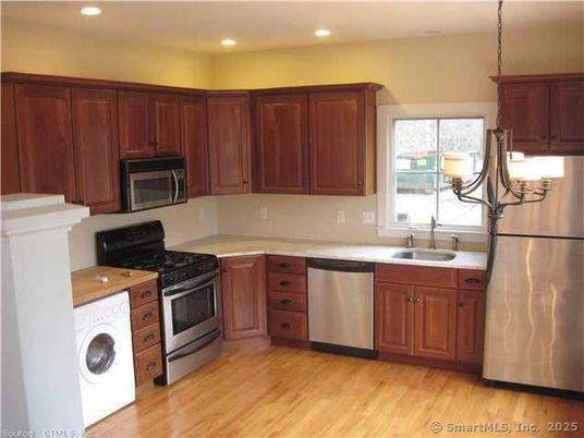 Interior, Kitchen, Pendant Lights, Recessed Lighting, Stainless Steel Appliances, Washer, Wood Texture Flooring